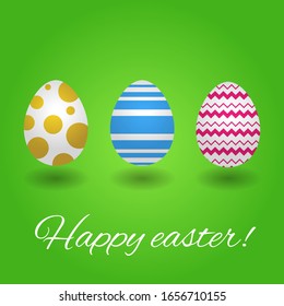 Varicoloured easter eggs on green background. Card