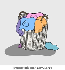 A variety of colored clothes are mixed in a wooden basket that looks dirty.Both phones are talking between mother and daughter.