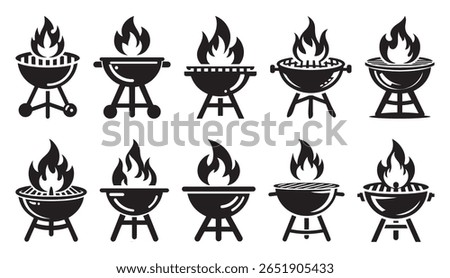 Various barbecue grills with flames cooking fire