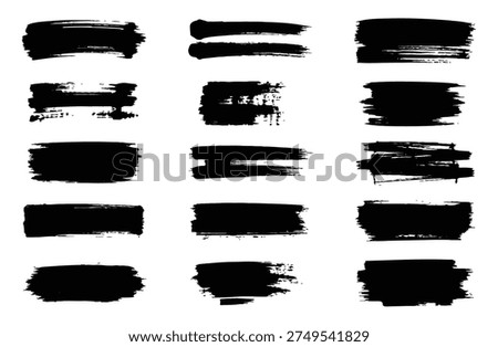 Various black brushstrokes create a dynamic and textured visual arrangement on a white background.