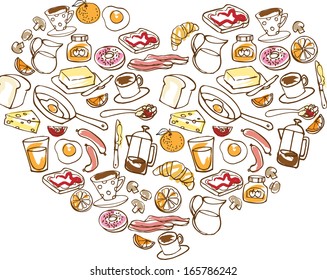 Various breakfast foods arranged in heart shape