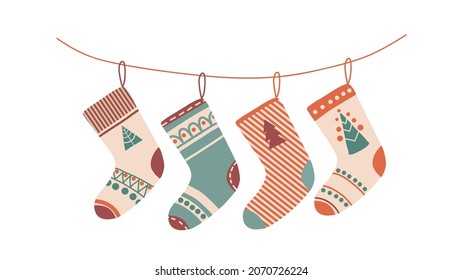 Various Christmas socks or stockings with different patterns. Traditional decorative element. Ornate holiday stockings and socks