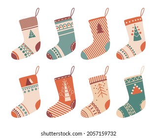 Various colorful Christmas socks or stockings with different patterns. Traditional decorative element. Ornate holiday stockings and socks