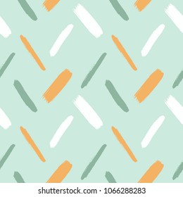 Various diagonal brush strokes, lines, stripes, streaks, bars seamless repeat pattern. Hand drawn colorful artistic texture. Doodle style mint green abstract background. Nature, eco, vegan colors.