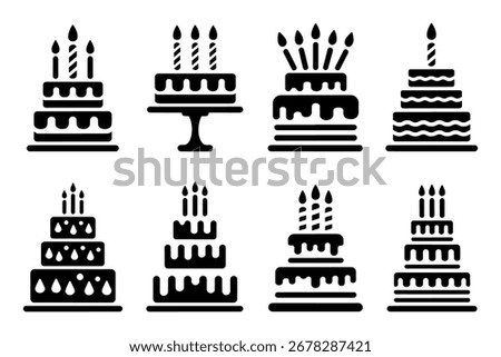 Various elegant and delectable cakes silhouette with lit candles