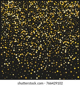 Various golden powder background of random scatter golden geometric figures isolated on black.
