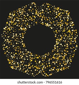 Various golden powder frame or border of random scatter golden geometric figures isolated on black.