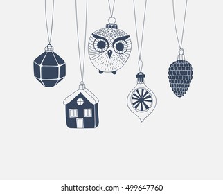 Various  hand drawn Christmas ornaments and baubles on light blue background.