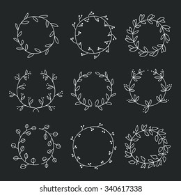 Various herbal wreaths, hand-drawn. Vector illustration on a black background.