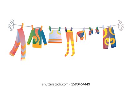 Various items of baby clothes on rope isolated vector illustration on white background. Laundry held by plastic pegs drying