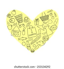 ?ollection of various items from the world of shopping on the background of yellow heart