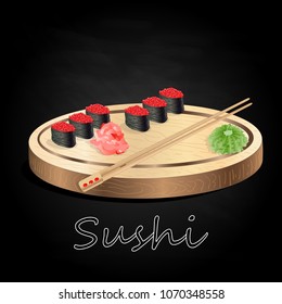 Various kinds of sushi served on wood desk black background isolated.