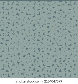Various particles or fragments sprinkled on the flat surface. A flecked sheet of paper. Pattern in two shades of blue.