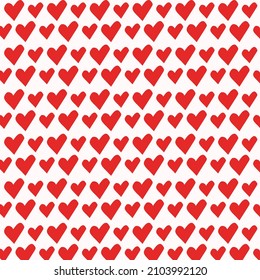 Various red hearts on white background