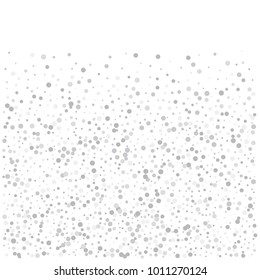 Various silver confetti background of random scatter silvery geometric figures isolated on white.