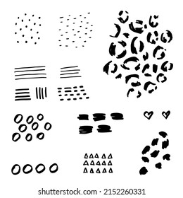 Various sketchy doodle shapes and objects. Freehand black hearts, curves, dots, spirals, leaves, leopard shapes. Grunge style. Hand-drawn abstract vector set. All elements are isolated