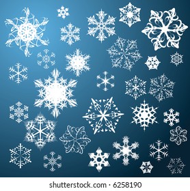 Verschiedene Schneeflocken auf blauem Hintergrund