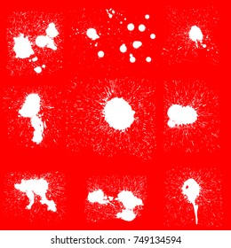 Various Spray paint graffiti decorative splatters. Vector splat set on red background