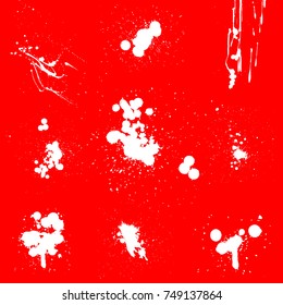 Various Spray paint graffiti decorative splatters. Vector splat set on red background