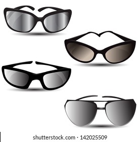 Various sunglasses on white background