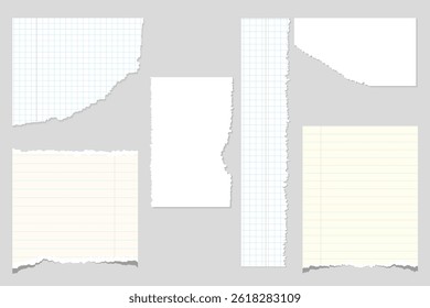 Various torn paper pieces on gray background.