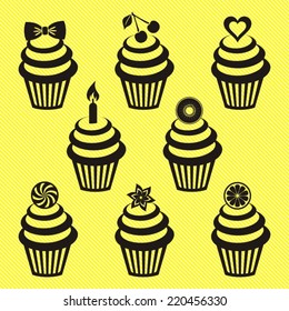 Various vector black cupcake silhouettes on yellow background