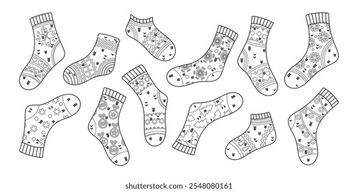 Various warm winter Christmas socks cute traditional black-and-white sketch design isolated set