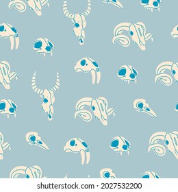 Various white Skulls of different animals and birds. Skull of ram, cat or tiger, buffalo or cow, saber toothed lion, lynx. Hand drawn trendy Vector seamless Pattern. Square blue background, wallpaper