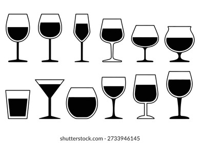 Various wine glasses filled with dark liquid drinkware