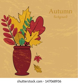 vase of red color with a bouquet of autumn leaves on an orange background.autumn background.vector