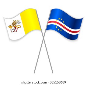 Vatican and Cabo Verdean crossed flags. Vatican City State combined with Cape Verde isolated on white. Language learning, international business or travel concept.
