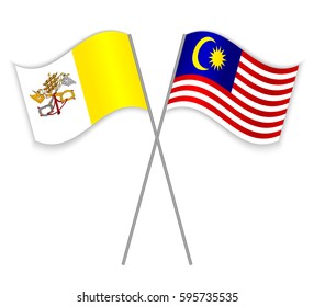 Vatican and Malaysian crossed flags. Vatican City State combined with Malaysia isolated on white. Language learning, international business or travel concept.