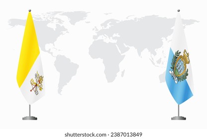 Vatican and San Marino flags for official meeting against background of world map.