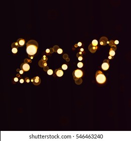 Vector 2017 Happy New Year glowing background with bokeh effect.