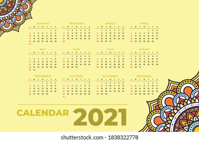 Vector of 2021 calendar with mandala design. Isolated with yellow color. 