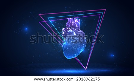 vector 3d human heart from triangular polygons on a blue background