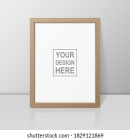 Vector 3d Realistic A4 Brown Wooden Simple Modern Frame on a Glossy White Shelf or Table with Reflection Against a White Wall. It can be used for presentations. Design Template for Mockup, Front View