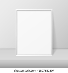 Vector 3d Realistic A4 White Wooden Simple Modern Frame on a White Shelf or Table and White Wall Background. It can be used for presentations. Design Template for Mockup, Front View