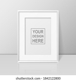 Vector 3d Realistic A4 White Wooden Simple Modern Frame on a Glossy White Shelf or Table with Reflection Against a White Wall. It can be used for presentations. Design Template for Mockup, Front View