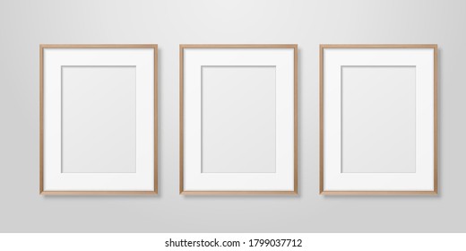 Vector 3d Realistic Three A4 Brown Wooden Simple Modern Frame on a White Wall Background. It can be used for presentations. Design Template for Mockup, Front View