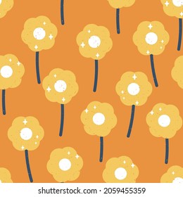 Vector 60s inspired Cute Daisies with Retro Texture in Orange and Blue seamless pattern background design. Perfect for scrapbooking, fabrics and web design projects.