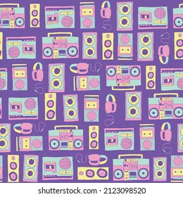 Vector 70s 80s retro cassette players, speakers, boombox, and headphones seamless repeat pattern background. Perfect for fabric, wallpaper, wrapping paper, scrapbooking projects.