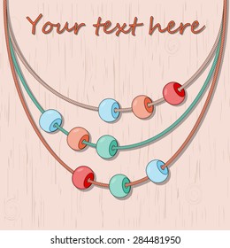 Vector abstract background with colored beads on the wooden table