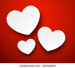 Vector abstract background composed of white paper hearts on red. Eps10. 