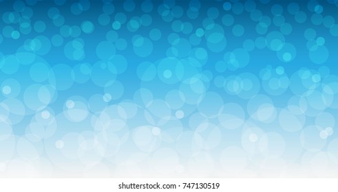 Vector abstract blue sky background with blur bokeh light effect.  Merry Christmas.