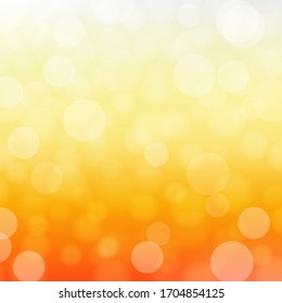 Vector Abstract bokeh lights effect with orange background.