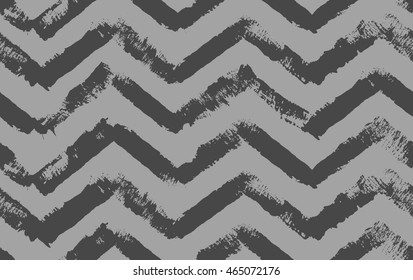 Vector abstract chevrons grungy seamless pattern. Dark grey texture. Modern grunge backdrop. 