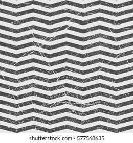 Vector abstract chevrons seamless pattern. Texture. Vintage texture. Repeating image.  EPS 8. Geometric pattern. Fond. Scratch. Worn surface. Black and white colors.