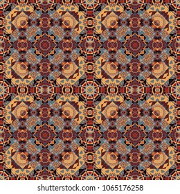 Vector abstract colorful painted kaleidoscopic graphic background. Seamless background pattern. Folk ethnic floral ornamental mandala in orange, brown and gray colors.