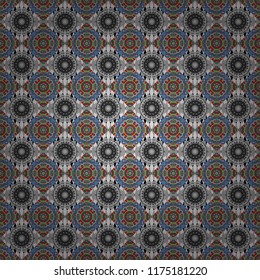 Vector abstract colorful painted kaleidoscopic graphic background. Seamless background pattern. Folk ethnic floral ornamental mandala in blue, brown and gray colors.